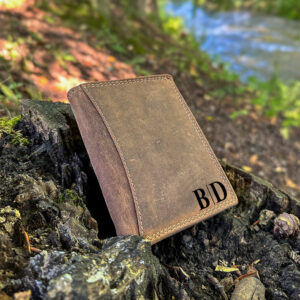 Sleek. Secure. Stylish. Our vertical leather wallet is a timeless piece every man needs. Made from genuine leather and handmade to perfection, it includes RFID protection to keep your cards safe. Custom engrave it for a unique, one-of-a-kind gift. #MensWallet #EngravedGift #LeatherWallet #HandmadeGift #GiftIdeasForMen #RFIDWallet #FathersDayGift #PersonalizedGift