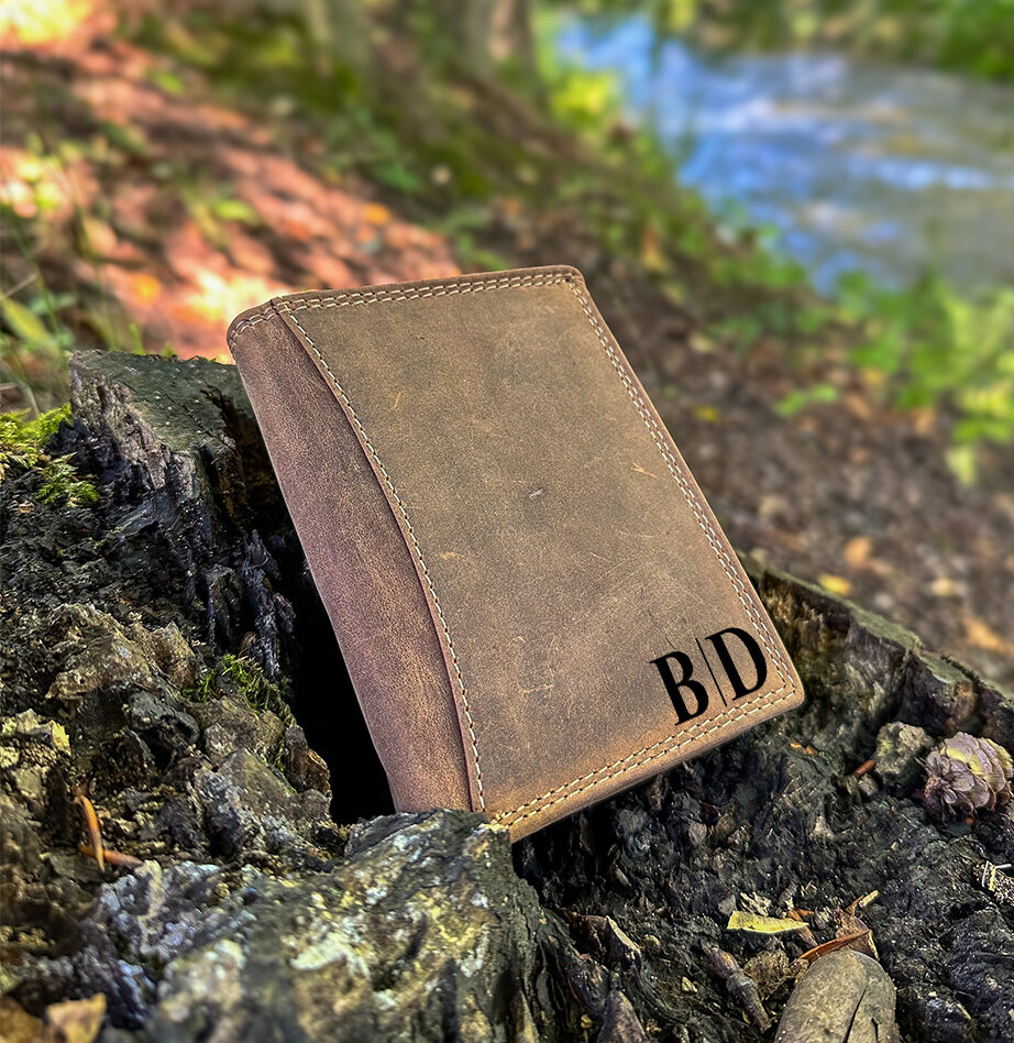 Sleek. Secure. Stylish. Our vertical leather wallet is a timeless piece every man needs. Made from genuine leather and handmade to perfection, it includes RFID protection to keep your cards safe. Custom engrave it for a unique, one-of-a-kind gift. #MensWallet #EngravedGift #LeatherWallet #HandmadeGift #GiftIdeasForMen #RFIDWallet #FathersDayGift #PersonalizedGift