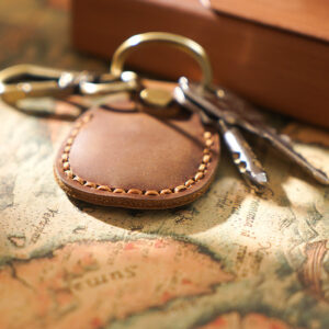 Keep your AirTag safe in style with our Personalized Cowhide Leather Keychain. Hand-stitched with a durable keyring, this genuine leather case is the perfect mix of protection and class. #AirTagHolder #LeatherKeychain #PersonalizedGift #GenuineLeather #HandStitched #EverydayCarry #StylishProtection #GiftIdeas2025