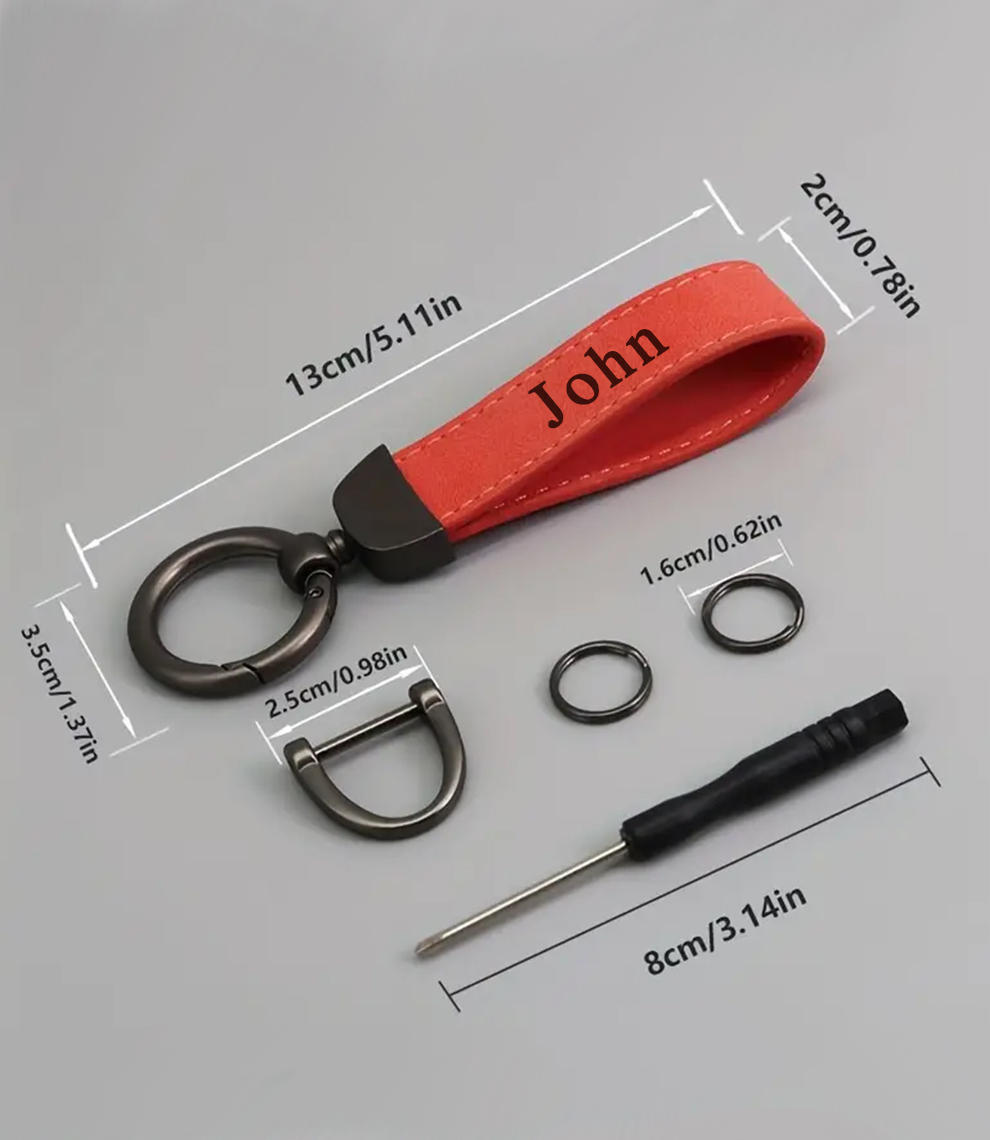 Elevate your everyday carry with this sleek custom keychain. Handmade from genuine leather and engraved with your name or DOB. A must-have for car enthusiasts and lovers of unique accessories. #EverydayCarry #LeatherKeyring #CustomEngraving #PersonalStyle #GiftForDrivers #KeychainAddict #CustomMadeForYou #TrendingGifts #MensFashion2025 #LeatherAccessories
