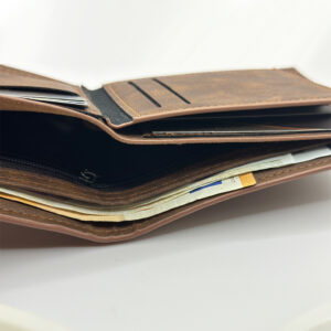 Crafted from premium vegan leather, this Retro Wallet offers a slim bifold design with card and cash holders. A vintage vibe with a modern conscience—perfect for Christmas gifts. #VintageVibes #EcoChic #PersonalizedWallet #MensAccessories #GiftForHim #SustainableStyle #SlimDesign #HolidayGiftGuide