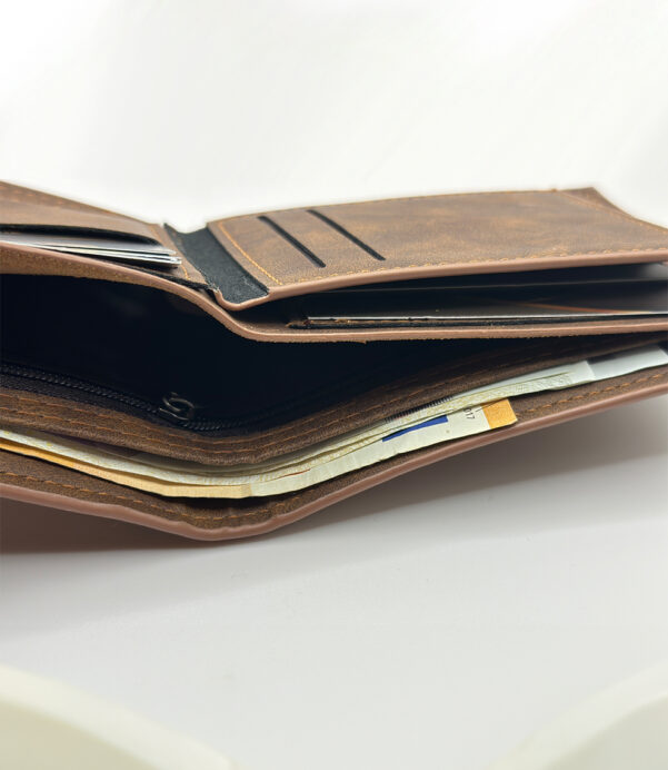 Crafted from premium vegan leather, this Retro Wallet offers a slim bifold design with card and cash holders. A vintage vibe with a modern conscience—perfect for Christmas gifts. #VintageVibes #EcoChic #PersonalizedWallet #MensAccessories #GiftForHim #SustainableStyle #SlimDesign #HolidayGiftGuide